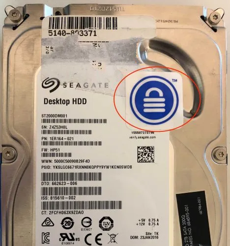 The first data recovery company put a sticker over the exposed screw.